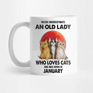 Never Underestimate An Old Lady Who Loves Cats And Was Born In January Mug